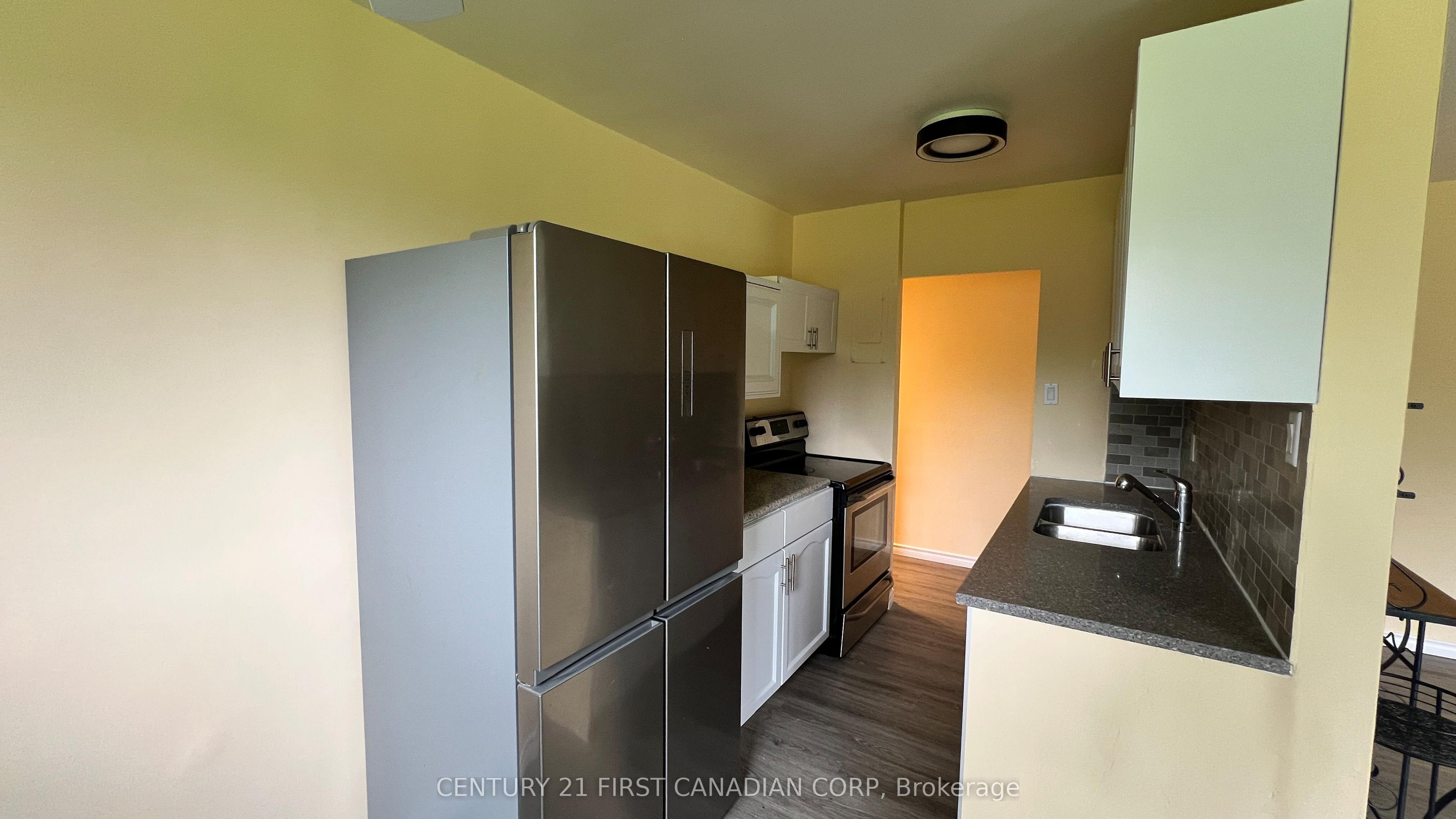 1830 DUMONT Street, Unit 207 — photo 1