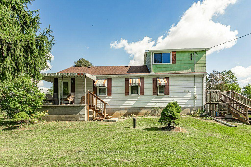4526 Wonderland Road S — photo 1